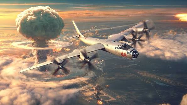 Heavy bomber flying above the clouds at sunset with a distant explosion on the horizon